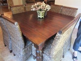 SQUARE SOLID WOOD KITCHEN TABLE AND 8(!) WICKER CHAIRS