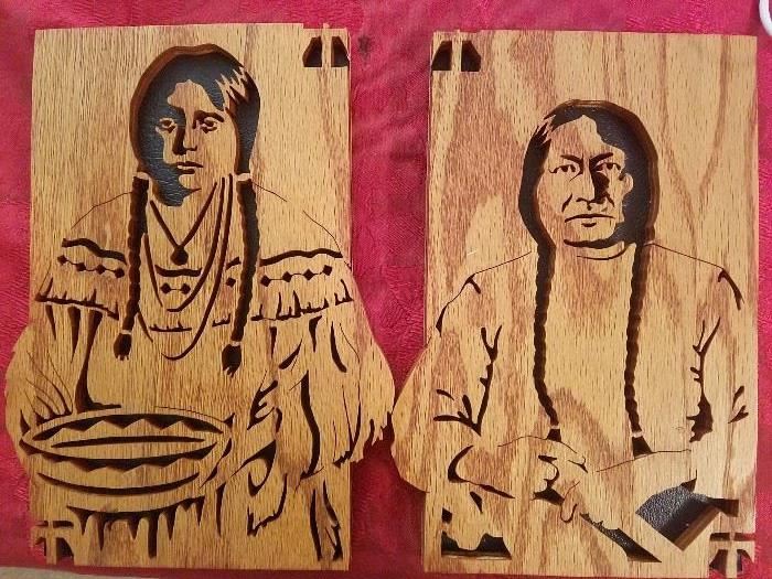 Indian man and woman, fretwork with leather backing