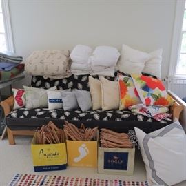 Queen size futon.  Pillows and linens galore!