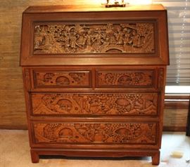 Beautiful Vintage Wood-Carved Secretary Desk
Beautiful Asian carvings. Very intricate. Top opens up to desktop w/ removable organizing shelves and a drawer. Features 4 intricately carved drawers. Overall good condition with some surface wear. 42”Tall x 27”wide x 17”deep. With desktop opened, 30”deep.