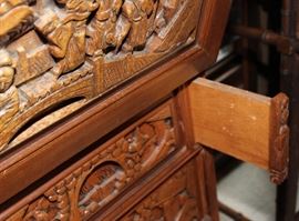 Beautiful Vintage Wood-Carved Secretary Desk
Beautiful Asian carvings. Very intricate. Top opens up to desktop w/ removable organizing shelves and a drawer. Features 4 intricately carved drawers. Overall good condition with some surface wear. 42”Tall x 27”wide x 17”deep. With desktop opened, 30”deep.