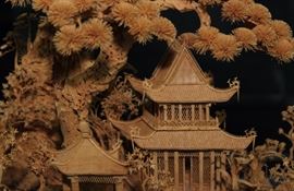 Vintage Intricate Carved Scene in Display Case
Appears to be carved from cork. Very detailed, very fragile. Features Asian-style house, gazebo, and bridge w/ foliage and bird-life.
Glass-case lifts off of wood base. Entire case measures 11"tall x 11"wide x 7"deep.
Overall good condition.