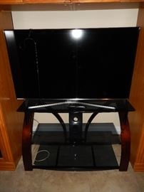 Large Samsung LED TV (cord across screen in picture).