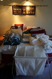 Loads of bedding for twin and queen size beds