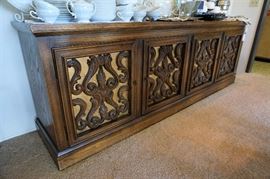 Mid Century buffet with carvings and drawers inside