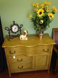 Antique washstand with happy sunflowers