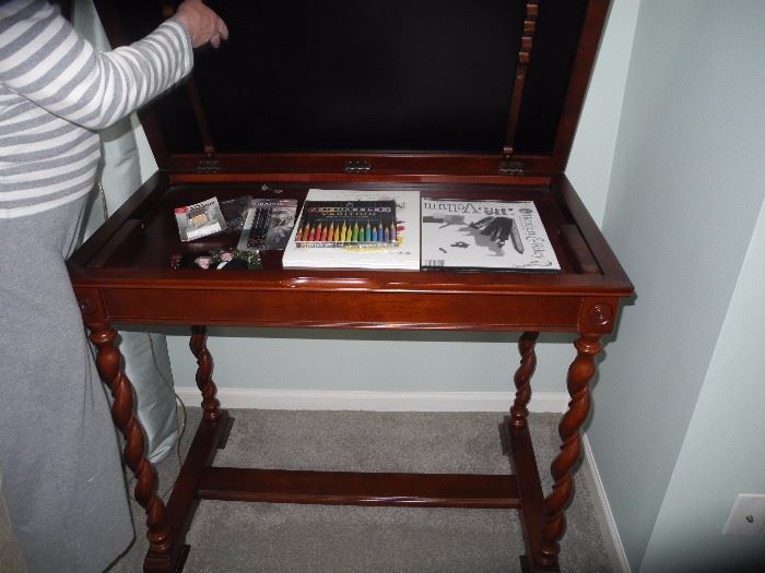 This side table opens up to a desk