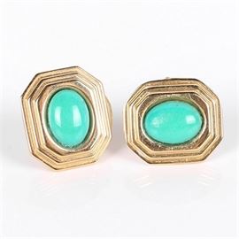 14K Yellow Gold and Turquoise Earrings: A pair of 14K yellow gold and turquoise stud earrings.