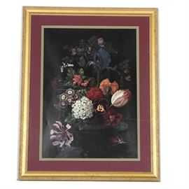 Large Floral Offset Lithograph on Paper: A large floral offset lithograph on paper. This offset lithograph features a floral arrangement in a vase in colors of black, white, purple, pink, red and green. This is presented under glass and is matted with a gold tone wooden frame.