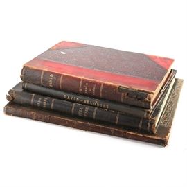 19th Century French and German Music Books: A collection of four 19th century French and German music books. This selection includes La Perle du Brésil by Félicien David, Vingt Mélodies pour Chant et Piano de Félicien David, Dir Jahreszeiten by Franz Joseph Haydn, and Die hohe Schule des Violinspiels by Ferdinand David. These books are partially bound in leather with marbled boards and gilt lettering to the spines.