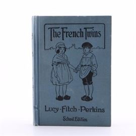 1918 School Edition "The French Twins" by Lucy Fitch Perkins: A 1918 School Edition The French Twins by Lucy Fitch Perkins. This school edition was published by Houghton Mifflin Company, Boston, 1918. This hardcover book has blue cloth boards with black lettering and illustration to the cover with black lettering to the spine.
