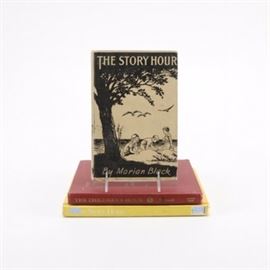 Children's Storybooks: A collection of children’s storybooks. This group includes three books, each presented with a cloth pressed hardbound cover. Featured are The Story Hour by Marian Black, The Children’s Hour by Arthur Maxwell, and The Story Hour compiled by Esther Bjoland.