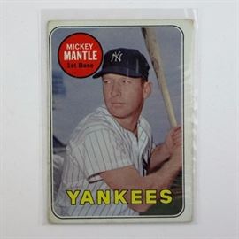 1969 Mickey Mantle #500 Topps Baseball Card: A 1969 Topps Mickey Mantle #500 baseball card in thick hard plastic case. Ungraded.
