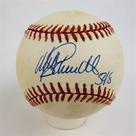 Signed Mike Schmidt Baseball COA: An autographed Mike Schmidt Rawlings official National League baseball. It is pen signed in blue in “the sweet spot”. The ball has a cushioned cork center. It comes with a COA from South Bay Baseball Cards, Inc., and clear plastic case.