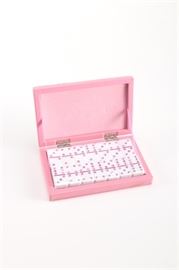 Pink Rhinestone Domino Set: A pink rhinestone domino set. The set features a pink dyed leather case with a furry leopard print top containing a twenty eight piece white domino set with pips that are pink rhinestones. Comes with instruction manual.