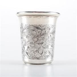 1853 Moscow 875 Silver Thimble: An 875 silver thimble made in 1853 from Moscow. This piece features a folded lip with an etched foliage body. The underside features Russian hallmarks with a date, “84” zolotniki, Moscow town mark, and an indiscernible maker’s initials.