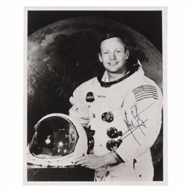 Neil Armstrong Signed Photo COA: An autographed black-and-white photo of Neil Armstrong. Neil is pictured in his NASA space uniform, an image of the Earth’s moon is in the background. Neil signed his name with a black marker. His signature has been authenticated by JSA; their sticker is on the back of the photo and a full letter is included. Neil is a native of Ohio and was the first person to set foot on the moon.