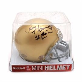 Paul Hornung Signed Helmet: A Paul Hornung autographed Notre Dame mini helmet. Paul signed the upper left side of the helmet and added, “56 Heisman” with a black marker. Paul won four NFL (National Football League) Championships, one Super Bowl and the Heisman Trophy. His signature has not been authenticated.