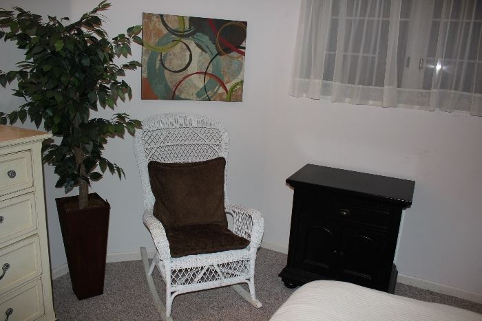 White Wicker Rocker with Ficus, Art, Cabinet and Dresser
