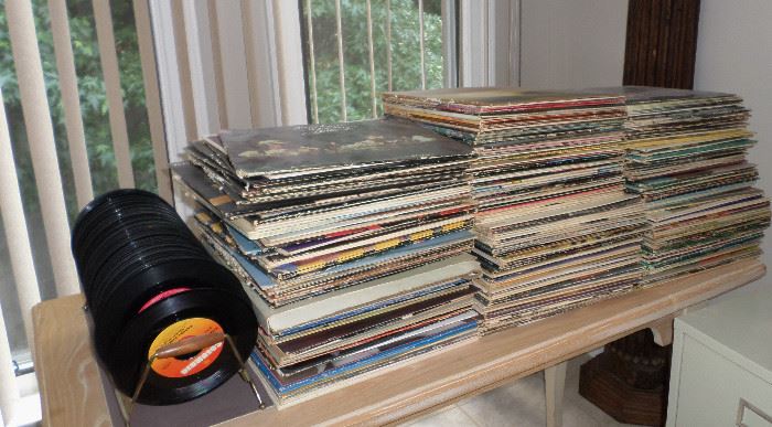 LOADS of albums - from the 1960's - 1980. Genres include old classic rock (Beatles, Monkeys, Janis Joplin & more) and vintage classic country 
