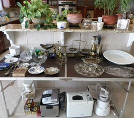 some of the variety of small kitchen appliances, serving plates & more