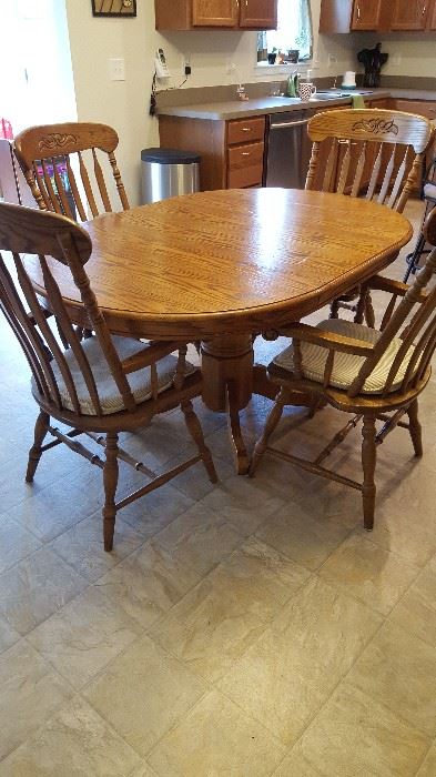 Oak Table w/leaf and 4 Arm Chairs