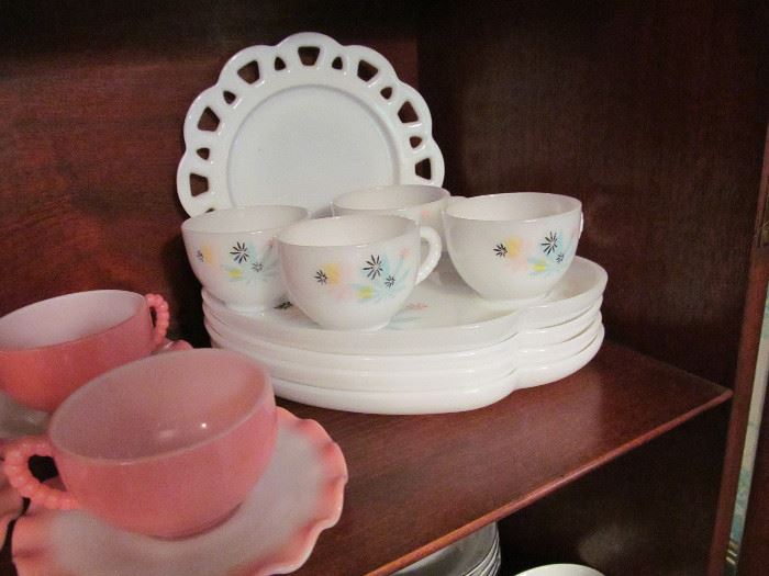 Sweetest little milk glass snack set and pink ruffled saucers with those teacups