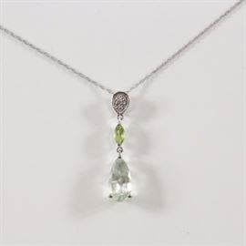 10K Peridot, Prasiolite, and Diamond Pendant Necklace: A 10K peridot, prasiolite and diamond pendant necklace.