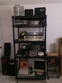 Speakers, VCR, Stereo/Record Player, recording devices, radios, computer monitors, Sidewinder controller, scanner, and tvs. 