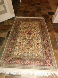 Oriental  hand woven rug  3 and half by 2 and half 
