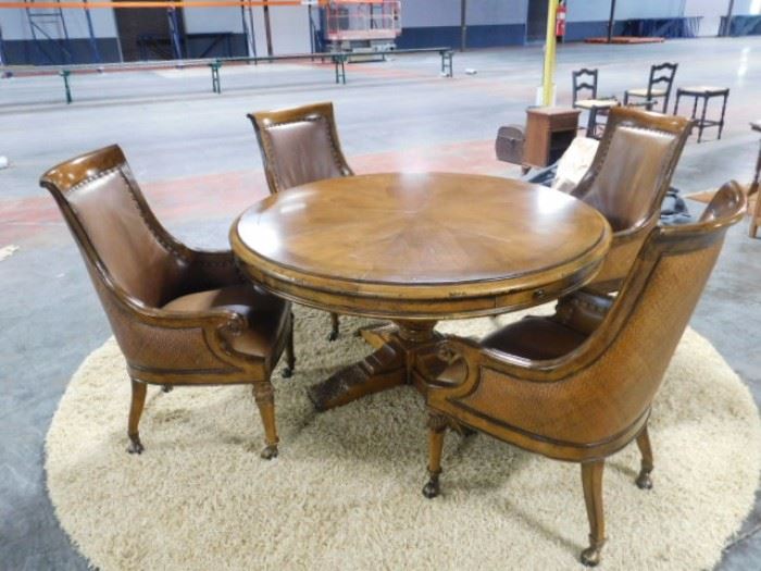 Henredon Celestial Expandable Walnut top 5 foot round dining table  4   Mahogany and  leather chairs on casters, with  leaves inserted  table is  7 foot round 