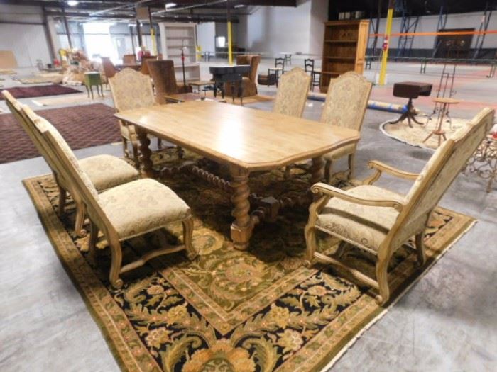 7 foot by 3 foot Bernhardt dining table with 2 Bernhardt  captains chairs and 4 armless chairs this is with 2 leaves not inserted 