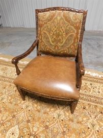 Leather seat and machine embroidered arm chair