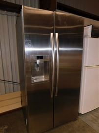 Samsung side by side fridge with ice maker and water dispenser. Model RS22HDHPNSR 35 by 30 by 70  22.3 Cubic feet 