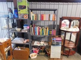 Hard back and soft back books plus metal shelving