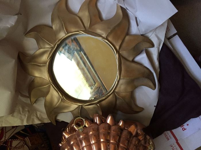Gold framed sun burst mirror