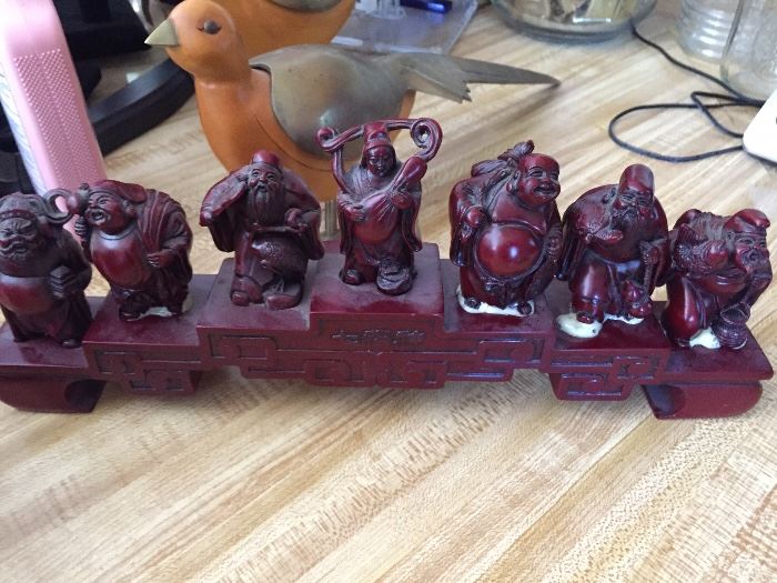 Asian figurines on base
