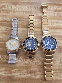 Invicta watches, far right has damage to band