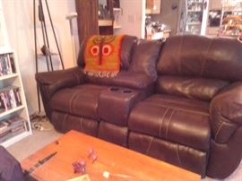 Recline sofa with cup holders and remote storage