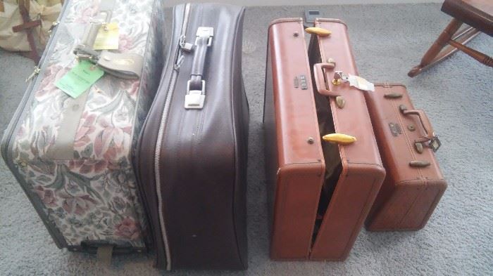 Assorted suitcases