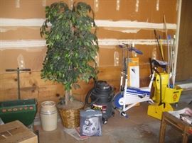 Exercise bike, cleaning bucket, Scotts spreader, new crock