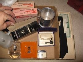 Playboy matches, key, glasses, lighter