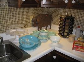 Teal blue items, spice rack etc