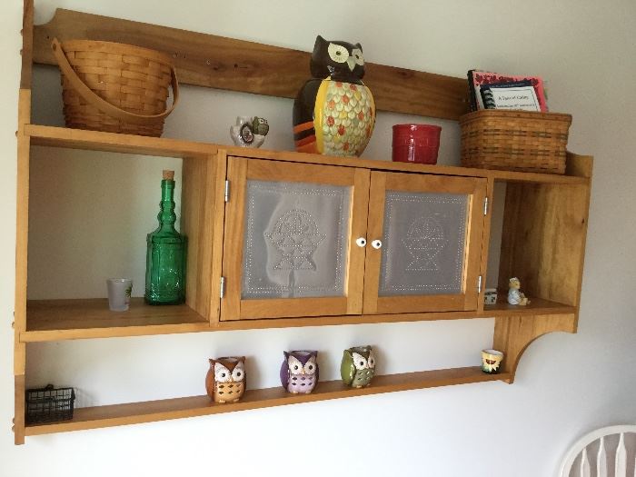 owl decor and some of the Longaberger baskets.   Sorry, shelf stays with the house