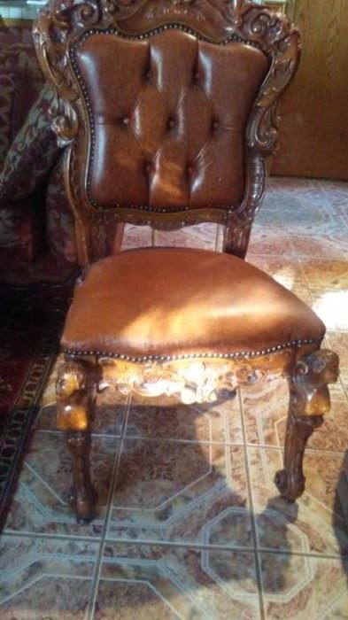 carved  leather chair