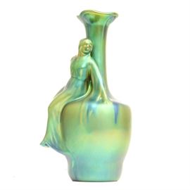 Vintage Zsolnay Hungarian Porcelain Vase: A vintage Zsolnay Hungarian porcelain vase. The vase features a female figure resting on the vase shoulder and an iridescent green glaze with blue and violet undertones. Makers mark to the underside.