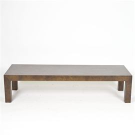 Burled Wood Coffee Table: A burled wood coffee table. This rectangular top table features a walnut-stained burled veneer and rises on block legs. The item is unlabeled.