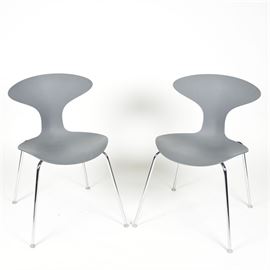 Mid Century Modern "Orbit" Chairs by Bernhardt Design: A set of Mid Century Modern Orbit chairs by Bernhardt Design. These gray plastic chairs designed by Ross Lovegrove have an hour glass figure and oval seat rising on four chrome legs terminating on padded feet. They are labeled “Bernhardt Design Orbit Made In USA” to the underside.