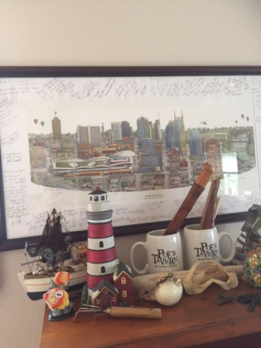 Custom Nashville Skyline with local bar customers signatures, and various Nautical theme decor, Knives, Mugs, Boat Figurines