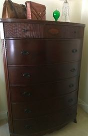 Gorgeous tall dresser, circa 1940's with inlaid wood design